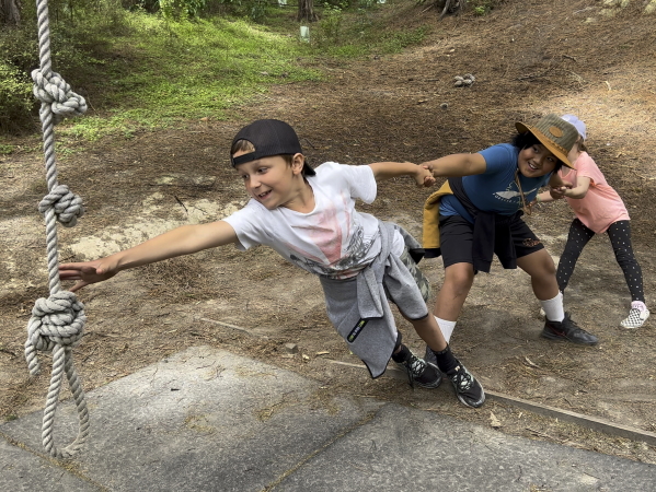 Children playing rope game